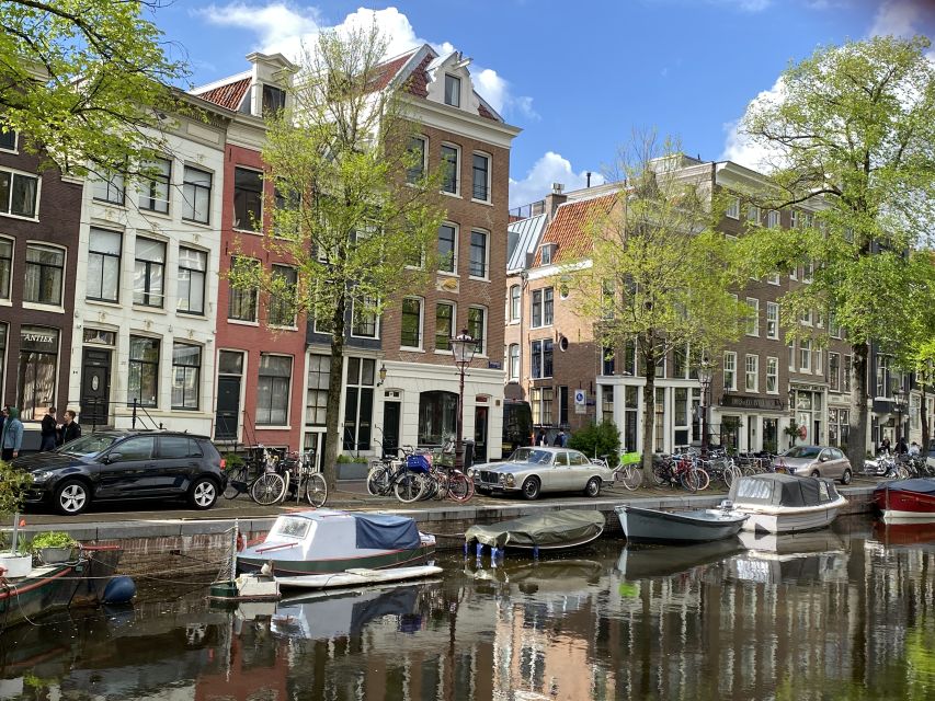 Amsterdam: Guided Off-The-Beaten-Track Walking Tour - From Beursplein to Dam Square, where you get your bearings fast