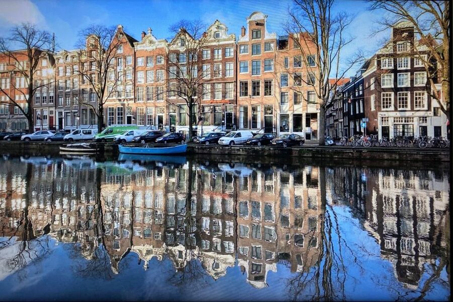 Amsterdam: Guided Off-The-Beaten-Track Walking Tour - Westerdoks, houseboats, and the Western Islands side of Amsterdam life