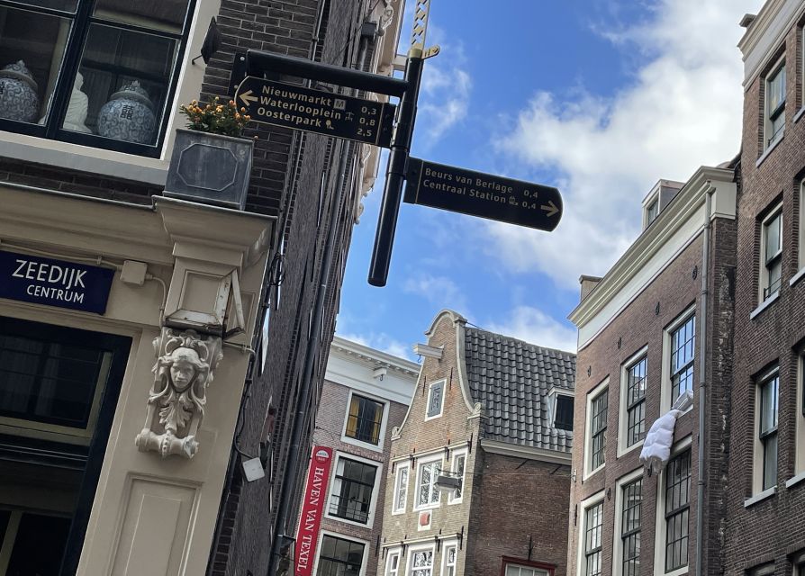 Amsterdam: Guided Off-The-Beaten-Track Walking Tour - Noordermaarkt: market-day atmosphere and practical food ideas