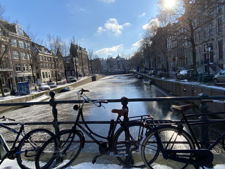 Amsterdam: Guided Off-The-Beaten-Track Walking Tour - Dam Square essentials: Royal Palace, National Monument, and Nieuwe Kerk