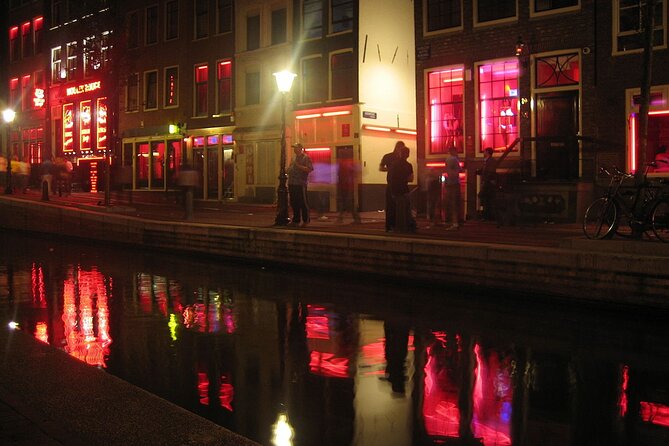 Amsterdam: Guided Red Light District and City Walking Tour - Pub The Ape (Int Aepjen): Wood, Fire, and Why It Survives