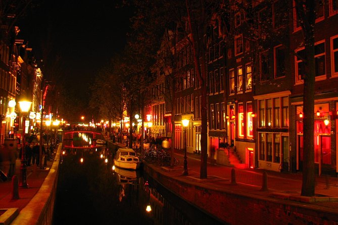 Amsterdam: Guided Red Light District and City Walking Tour - The Smallest House of Amsterdam and VOC Storage to Real Living