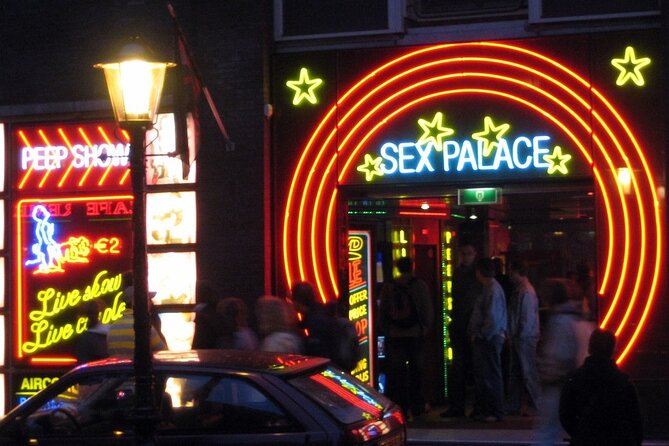 Amsterdam: Guided Red Light District and City Walking Tour - Condomerie: The City’s Modern Retail Quirk in a Historic Neighborhood