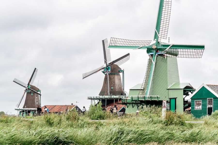 Amsterdam: Guided Zaanse Schans, Windmills & Cheese Tour - Amsterdam canal cruise voucher option: a good add-on for Golden Age views
