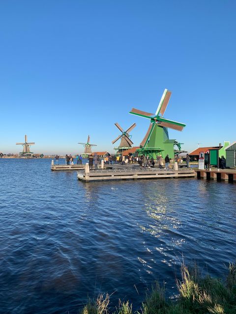 Amsterdam: Guided Zaanse Schans, Windmills & Cheese Tour - Bus comfort, group size, and what the guide brings to the day