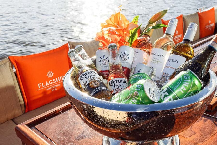Amsterdam: Heated Canal Cruise with Unlimited Drinks & Bite - Electric canal cruising for first-time orientation