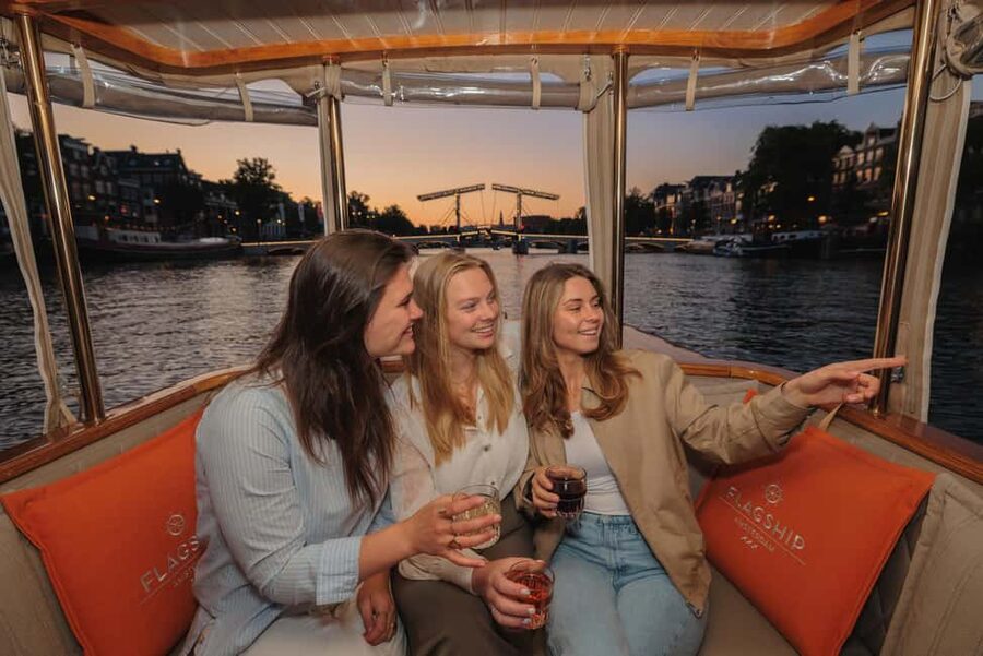 Amsterdam: Heated Canal Cruise with Unlimited Drinks & Bite - Hermitage Museum and Skinny Bridge, plus the posh Amstel Hotel view