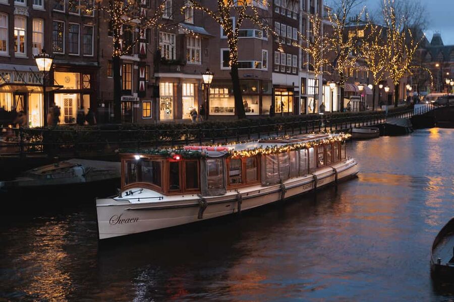 Amsterdam: Heated Canal Cruise with Unlimited Drinks & Bite - Where the boat takes you, from the museum quarter to the Golden Bend