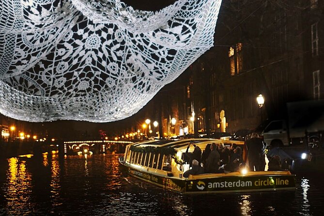 Amsterdam: heated Light Festival Cruise | Incl. Drinks Option - Your Route: Jordaan, UNESCO Canals, and Landmarks You Recognize Instantly