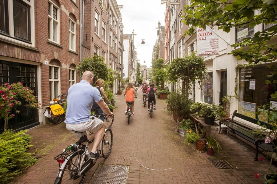 Amsterdam: Hidden Gems & Highlights Guided Bike Tour - Weather, Clothing, and Bike Safety, Without the Drama