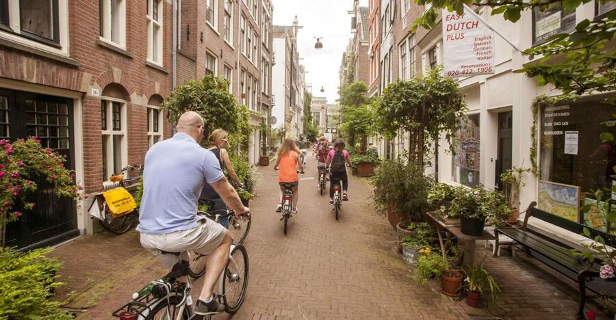 Amsterdam: Hidden Gems & Highlights Guided Bike Tour - The Jordaan Part: Quiet Courtyards, Churches, and Canal Ring Views