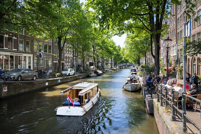 Amsterdam High-End Dutch Food & History Tour - Up to 8 guests - Fish Shop Classics: Herring, Fried Cod, Smoked Eel