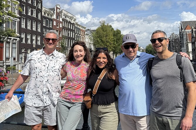 Amsterdam Highlights and Hidden Gems Walking Tour with Fun Guide - Key highlights you will actually feel on the street
