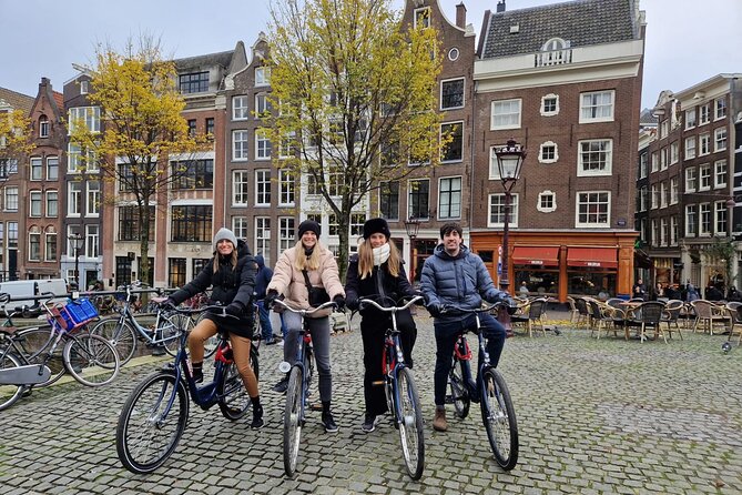 Amsterdam Highlights Bike or E-Bike Tour - Nieuwmarkt and the Maritime Museum ship sight