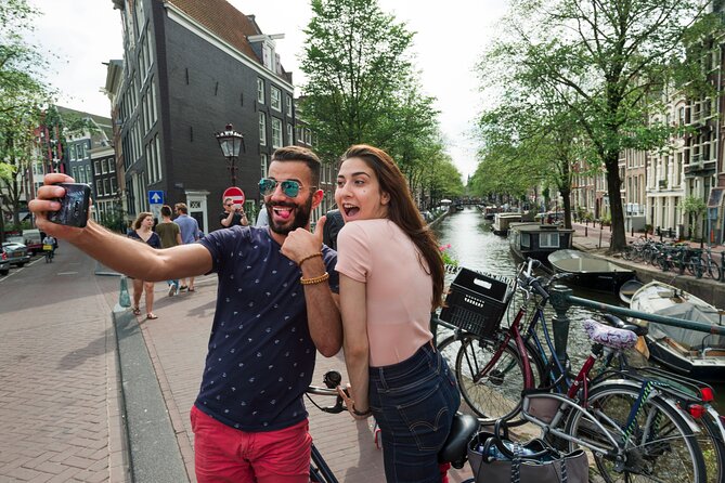 Amsterdam Highlights Bike Tour - Guided in EN/ES/DE/NL - Portuguese Synagoge and the Skinny Bridge: Icon + Depth