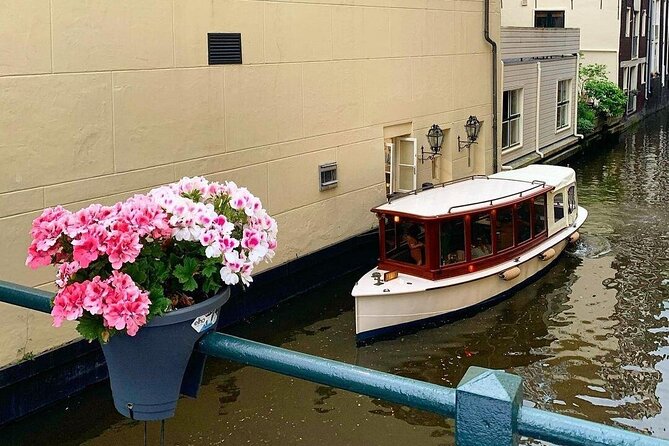 Amsterdam Highlights Canal Cruise with a Drink - Timing, weather, and how to plan for 1 hour 30 minutes on the canals