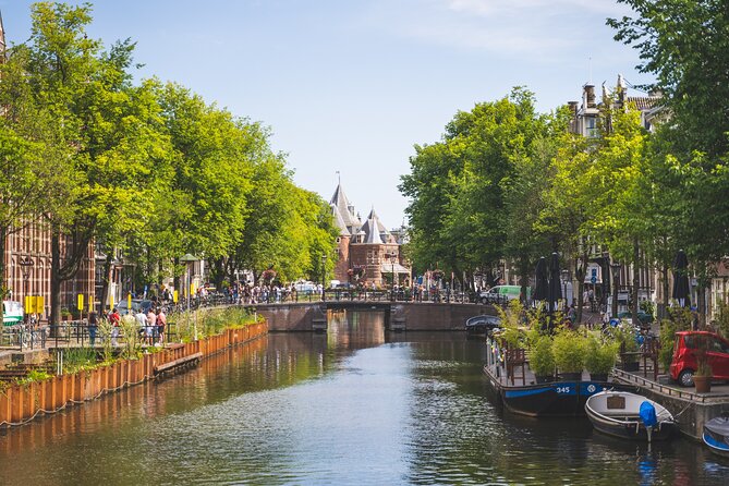 Amsterdam Highlights Small-Group Walking Tour - From Beursplein to Amsterdam Centraal: the station as a landmark