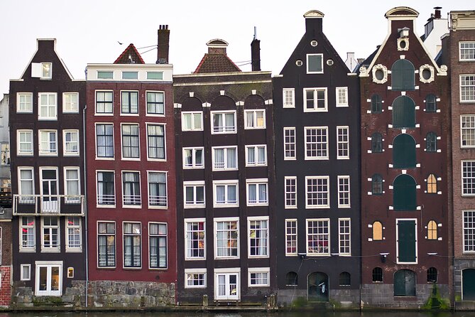 Amsterdam Highlights Walking Tour - Dam Square: Royal Palace energy and the National Monument at the start