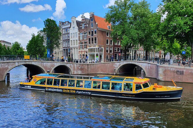 Amsterdam: Historic City Sightseeing Canal Cruise - Houseboat Museum: Hendrika Maria, a former cargo ship