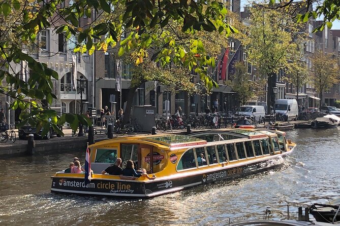 Amsterdam: Historic City Sightseeing Canal Cruise - Churches turned concert venues, plus Amsterdam’s main station energy
