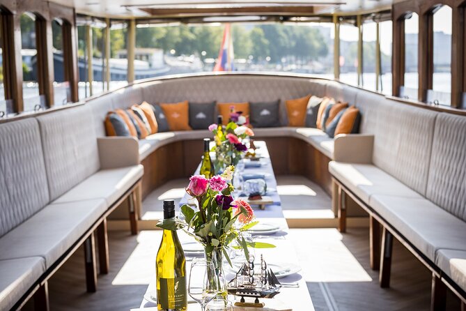 Amsterdam Historic Tour On Classic Saloon Boat - Key highlights worth knowing