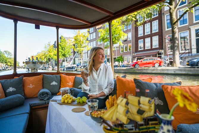 Amsterdam Historic Tour On Classic Saloon Boat - The 1-hour itinerary, stop by stop, and what to look for
