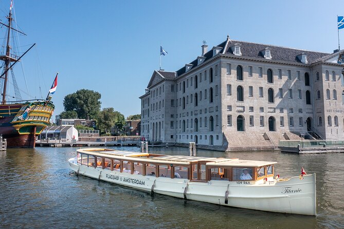Amsterdam Historic Tour On Classic Saloon Boat - Onboard bar, cheese, blankets, and how to plan what to bring your day