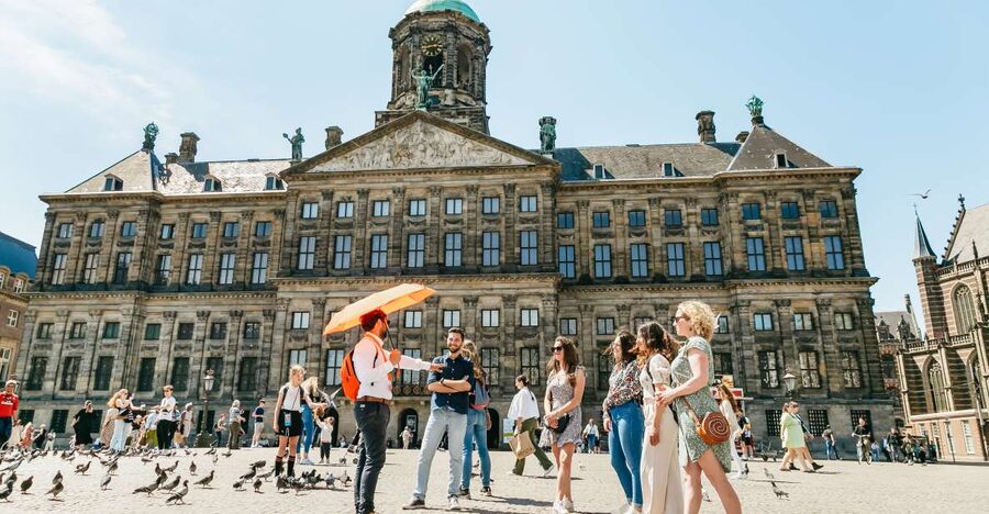 Amsterdam: Historical Highlights Walking Tour with Tasting - Bridges, locks, and the Amstel River, where the city gets its power