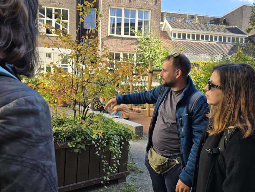 Amsterdam: History, Hidden Gems & Future Eco-Walking Tour - Quiet Routes, Courtyards, and the Art of Avoiding Crowd Time