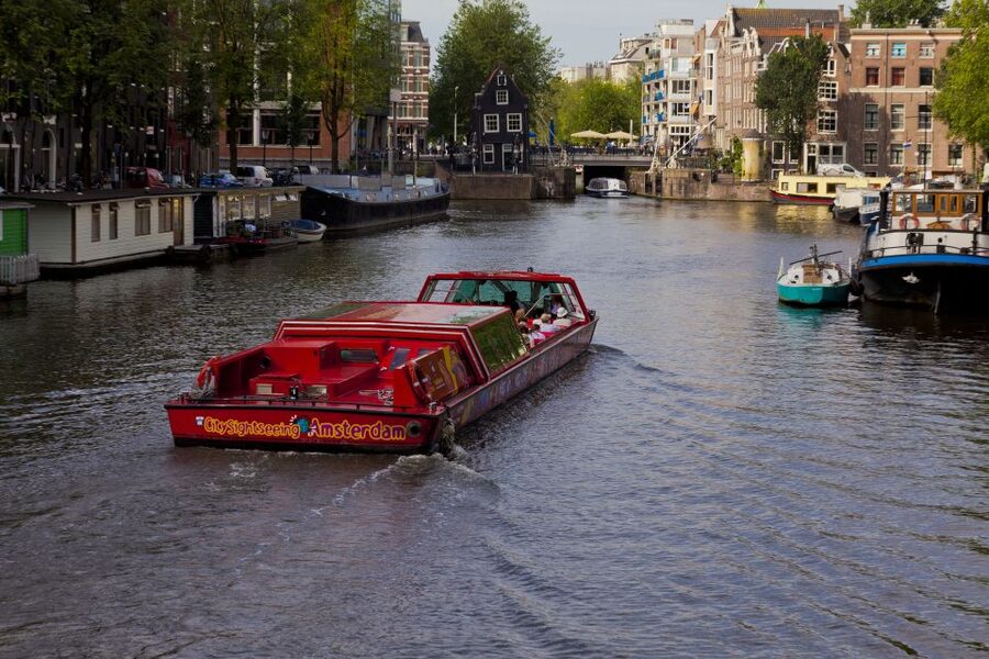 Amsterdam: Hop-On Hop-Off Bus and Boat options - The “included” extras that make the ticket feel like a deal