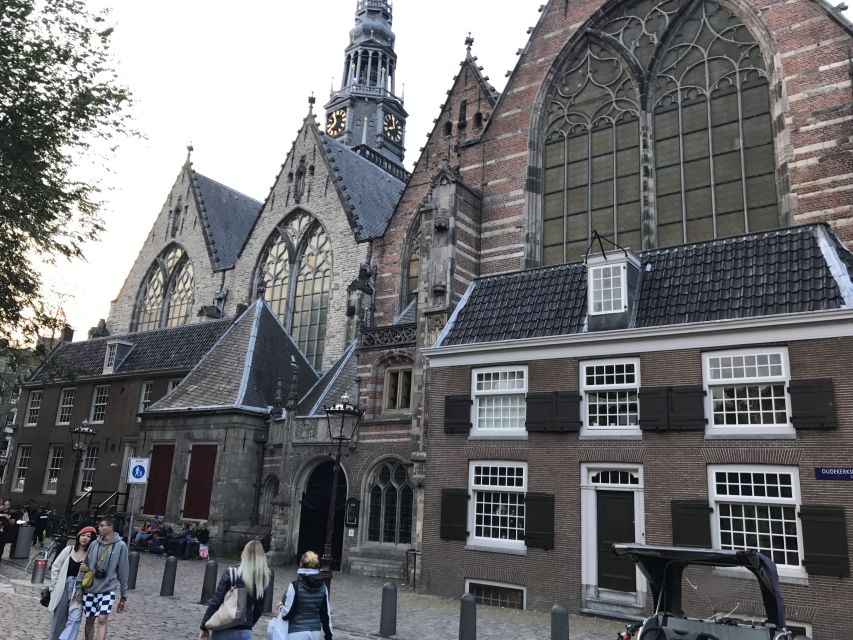 Amsterdam: Introduction walking tour - Dam Square and the Royal Palace area, with a breather in the middle