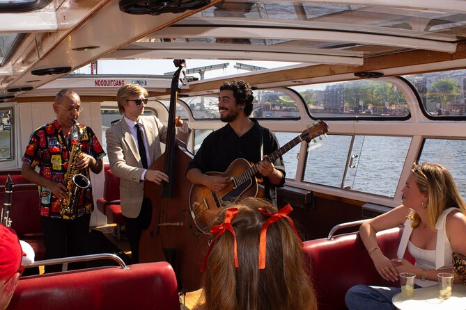 Amsterdam Jazz Canal Cruise with live music - What You See on the Canals, from Tight Waterways to Sunset Homes