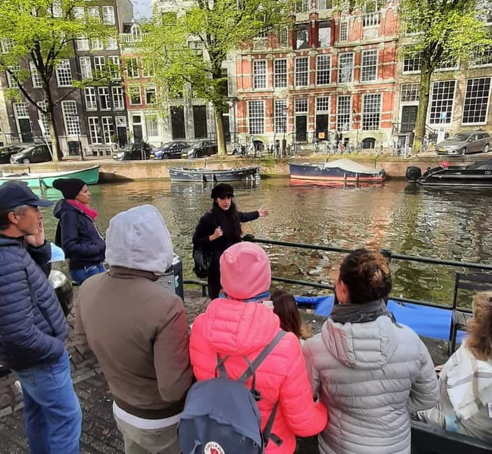 Amsterdam: Jordaan Area Walking Tour - Torensluis Bridge to Herengracht: learning Amsterdam by walking the canal edges