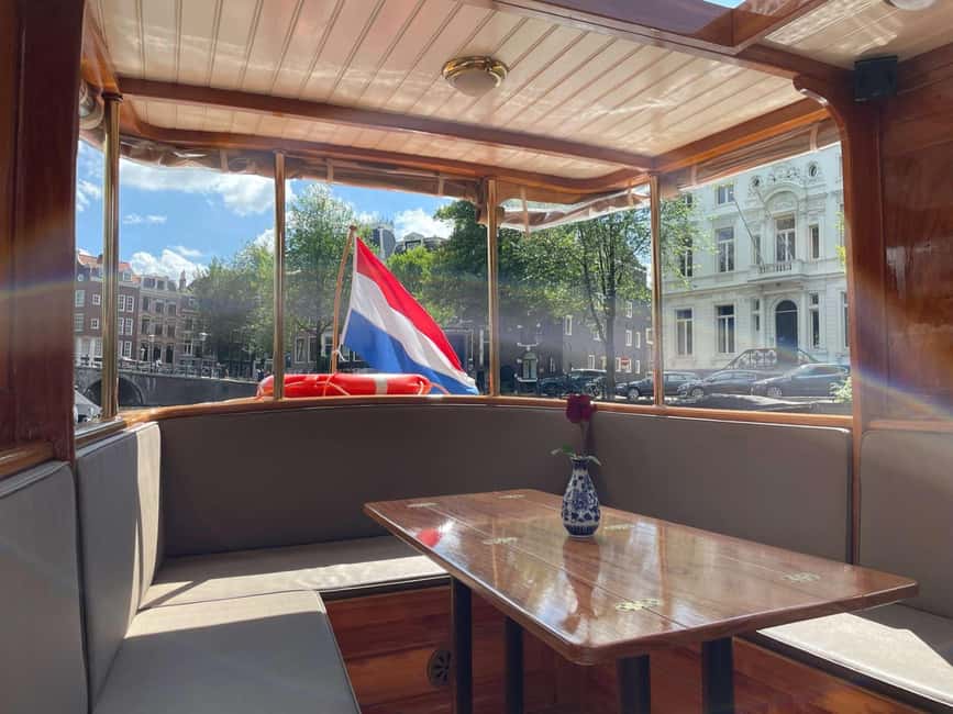 Amsterdam: King's Day Party Cruise with Open Bar & Music - Key highlights at a glance