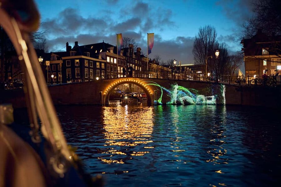 Amsterdam: Light Festival Boat with Hot Choco & Stroopwafel - The Host and Skipper: The Difference Between Seeing Lights and Understanding Them