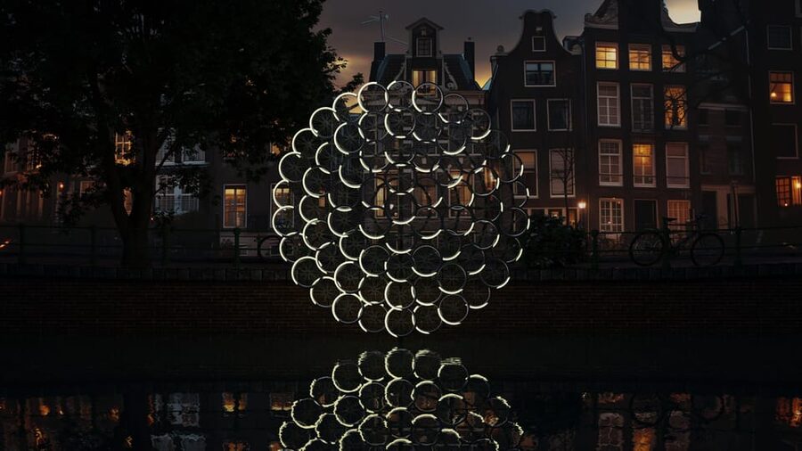 Amsterdam: Light Festival Canal Cruise w/Snack and Hot Drink - Entering the Light Festival From a Canal, Not a Sidewalk