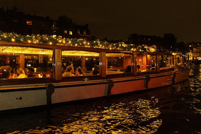 Amsterdam Light Festival: Heated Cruise with Hot Drinks & Bite - The heated saloon boat: comfort, but expect a trade-off