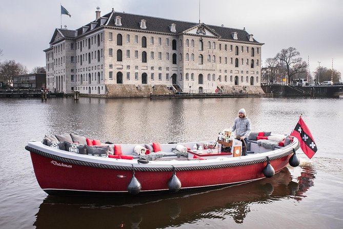 Amsterdam Light Festival: Saloon Boat Cruise + Hot Drinks & Bite - Weather, rain, and delays: how to stay comfortable on a night cruise