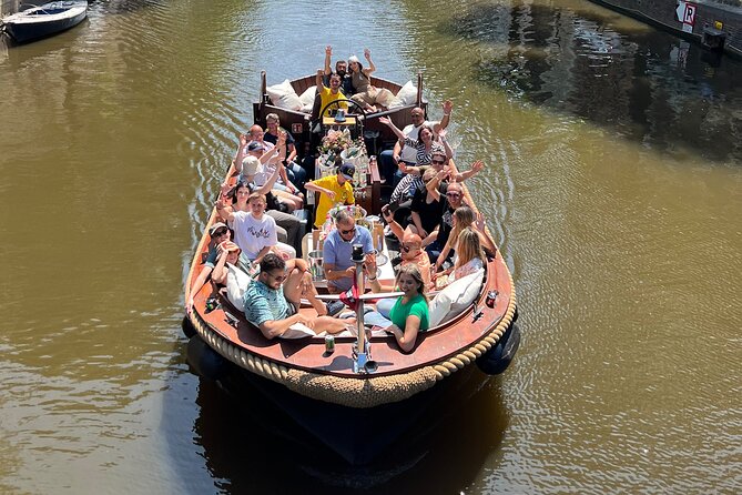 Amsterdam Luxury Boutique Boat tour with Unlimited Beer and Wine - The Skinny Bridge photo moment and why your captain points it out
