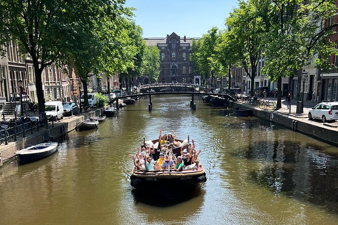 Amsterdam Luxury Boutique Boat tour with Unlimited Beer and Wine - The sights you catch: De Wallen, Rembrandt area, and Oude Kerk neighborhood