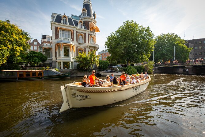 Gabled houses along an Amsterdam canal at dusk