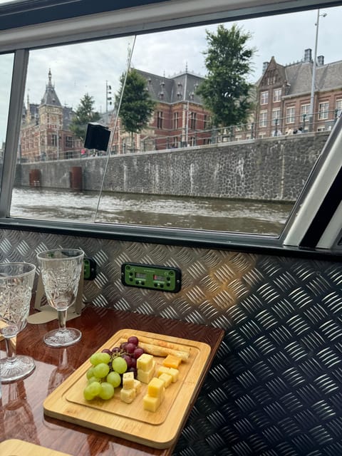 Amsterdam: Luxury Cheese & Wine Canal Cruise - Dress for the canal breeze, especially if it feels open-air