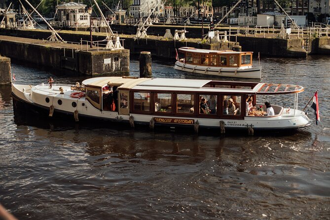 Amsterdam: Luxury Saloon Boat Cruise with Cocktails & Waffle - What’s included, what’s not, and what you might want to bring