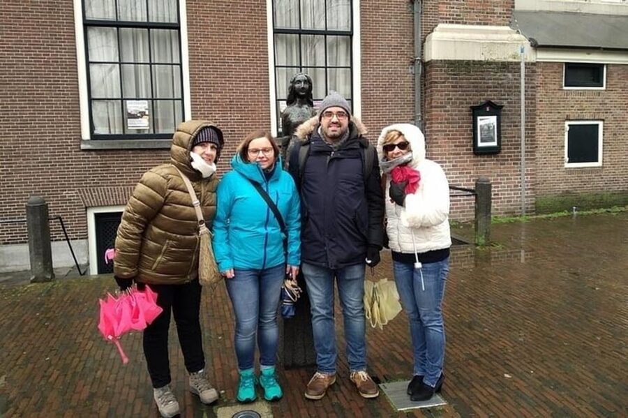 Amsterdam: Must-See Attractions Guided Walking Tour - Dam Square and the Royal Palace: the center of attention, explained
