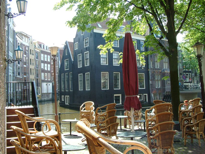 Amsterdam Old City Private Walking Tour - Canal power: merchants, East India Company ties, and the Herengracht