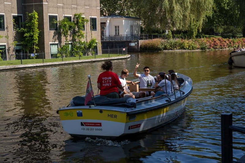 Amsterdam: Open Boat Canal Cruise (with Free Spritz Option) - How the skipper-guided element really works