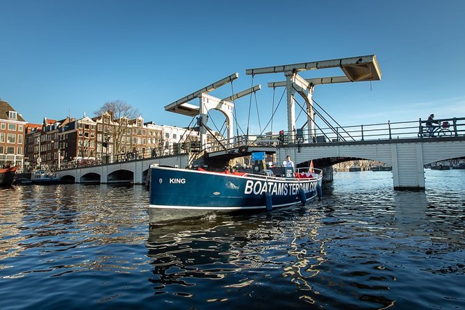 Amsterdam Open Boat Cruise with Live Guide and Two Drinks - Open-Air in Summer, Covered in Cooler Weather, Heated Seats in Winter