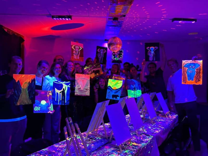 Amsterdam: Paint and Sip in the Dark at Rembrandt van Wine - The idea: neon art plus “sip and paint in the dark”