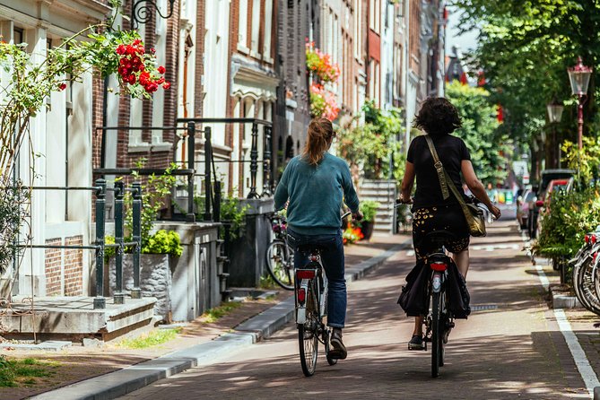 Amsterdam PRIVATE Bike Tour With Locals: Bike & Local Snack Included - Homomonument (Gay Monument): where the tour slows down in the best way