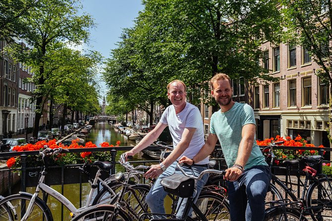 Amsterdam PRIVATE Bike Tour With Locals: Bike & Local Snack Included - Guides and what you can expect from your host